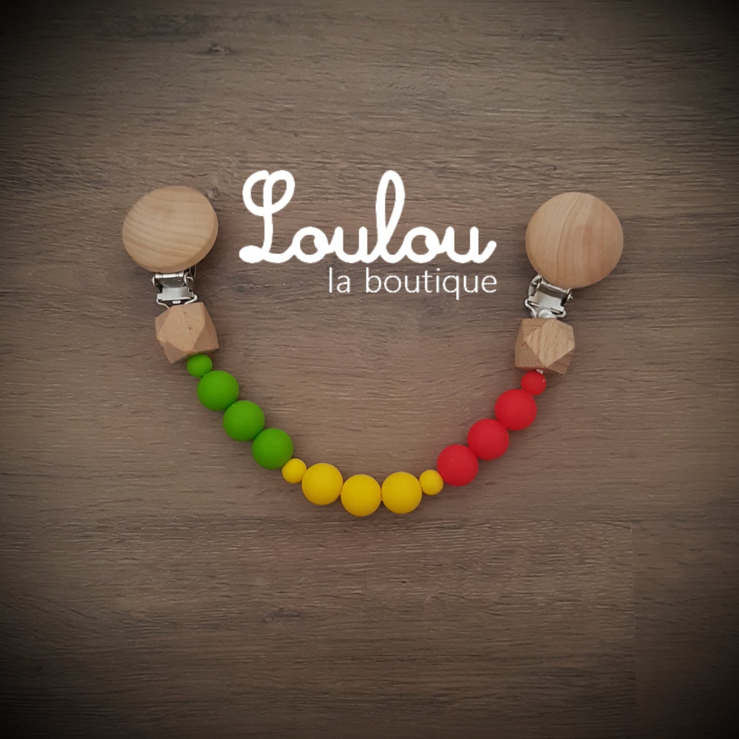 attache doudou attache-doudou Loulou la boutique cadeau naissance éveil dentition accessoire bébé baby shower liste de naissance perle silicone sans BPA bois vert jaune rouge